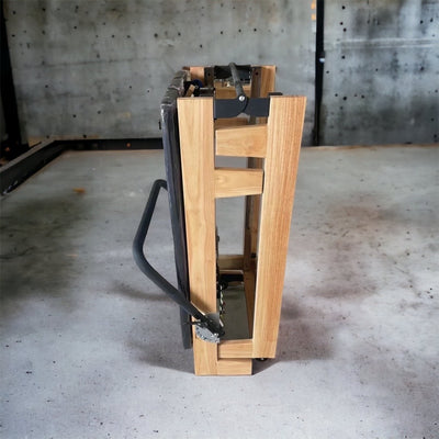 Compact Pilates reformer stored under bed